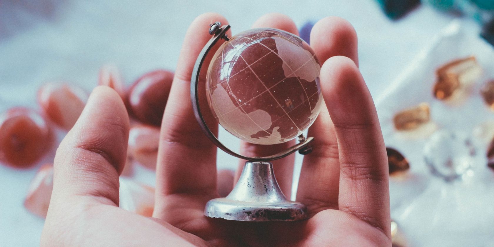 Small Crystal Globe in Hand