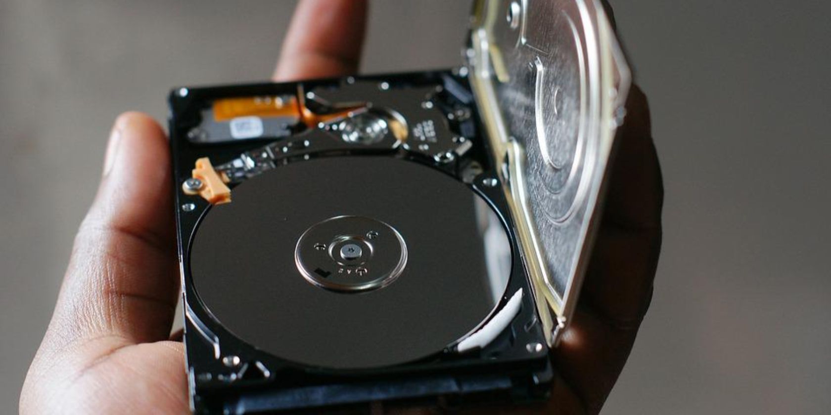 man with a corrupt hard disk in his hand